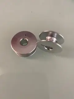 סלילים אלומיניום למכונות תפירה תעשייתיות